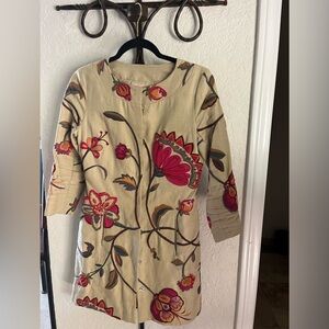 Overcoat . Embroidered light overcoat.